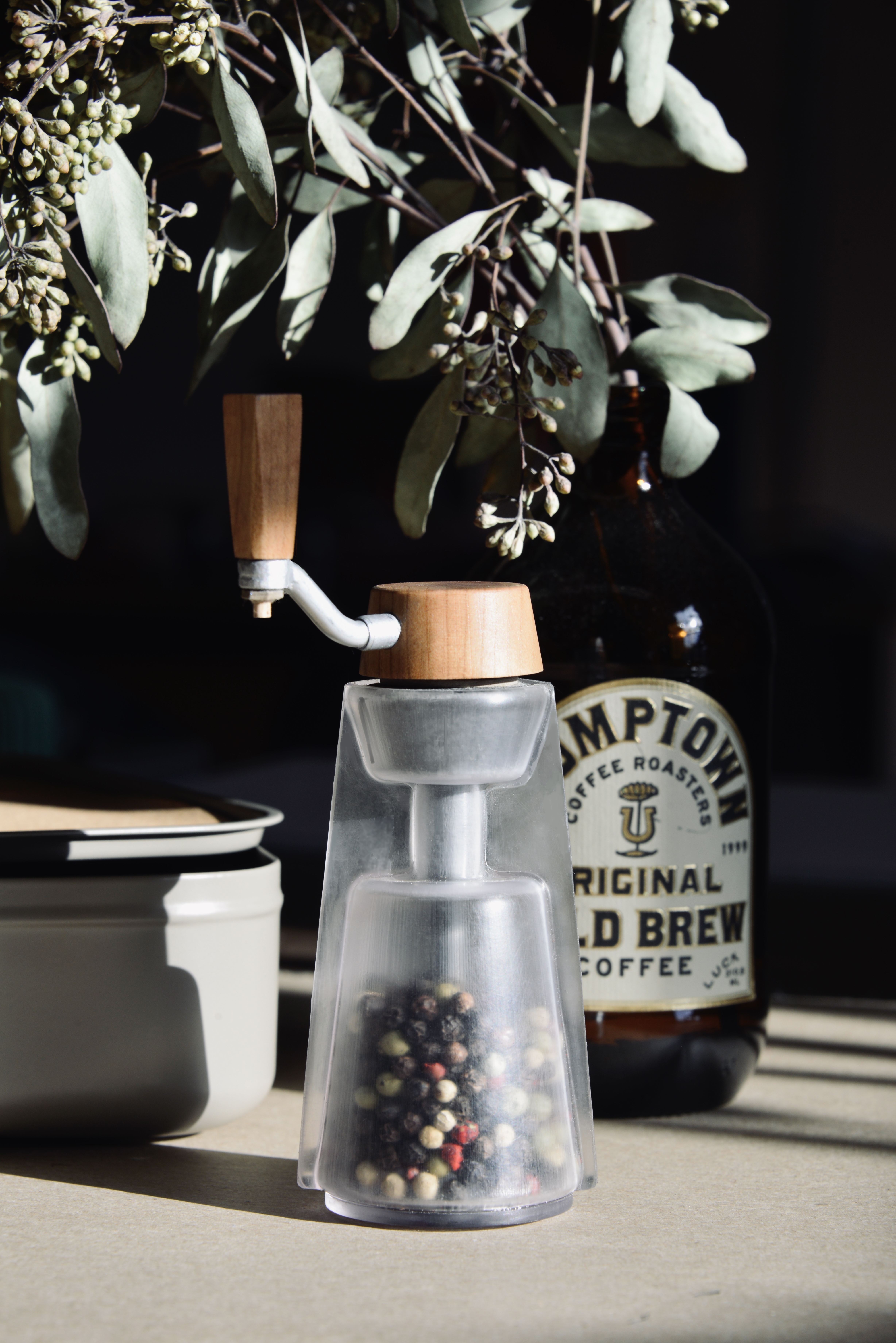 SHI grinder with coffee and dried botanicals