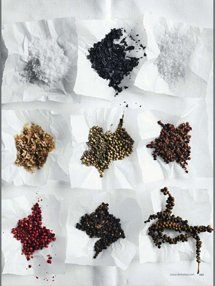 Assorted salts and peppercorns