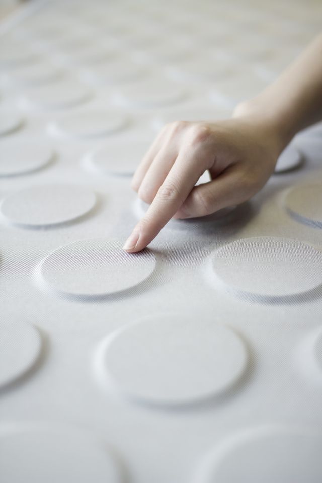 Hand interacting with a tactile bumpy surface